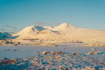 The Black Mount covered in snow at Lochan na h-Achlaise in the Scottish Highlands