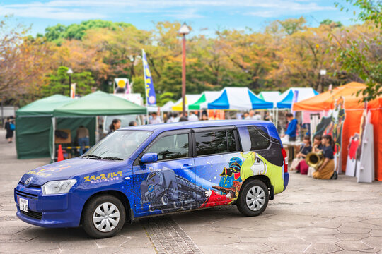 tokyo, asukayama - nov 03 2019: Japanese car wrapped with an illustrated sticker depicting the heroes of the manga and anime series Galaxy Express 999 by Leiji Matsumoto at the Leiji World Summit.