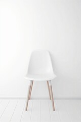 white chair on a wall