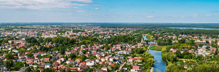 Fototapeta na wymiar Augustow city by Netta river and Necko lake aerial landscape under blue sky