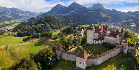 Switzerland travel and landmarks. scenic medieval village and castle Gruyere. canton Fribourg. Aerial drone video. - 732726602
