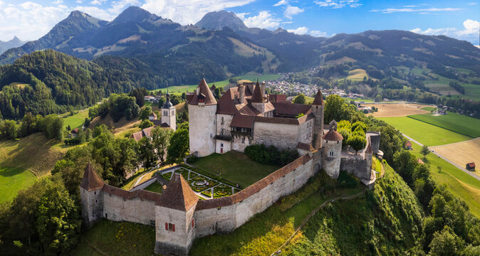 Switzerland travel and landmarks. scenic medieval village and castle Gruyere. canton Fribourg. Aerial drone high angle view
