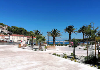 View of the beach promenade in Jelsa, Hvar island, Croatia - obrazy, fototapety, plakaty