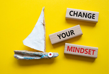Change your mindset symbol. Concept words Change your mindset on wooden blocks. Beautiful yellow...