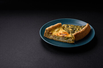 Delicious crispy quiche cut into slices with cheese, broccoli, tomatoes