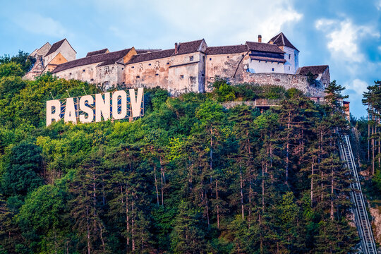 Rasnov citadel and city sign view on the hill, Romania