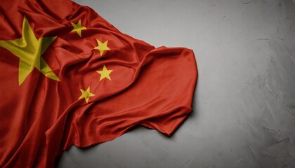 waving national flag of china on a gray background