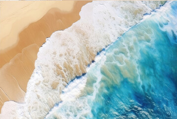 Aerial view of a beautiful sandy beach and turquoise ocean waves