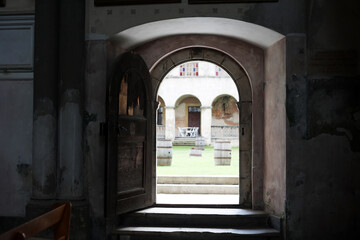 Doors with an arch in an old house. Overlooking the yard