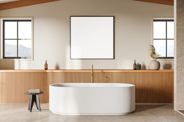 Beige bathroom interior with tub and poster