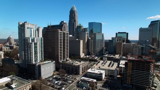 Aerial Upward Shot Of Office Towers In Financial District Against Sky On Sunny Day - Charlotte, North Carolina