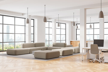 White office coworking interior work desk and chill zone near panoramic window
