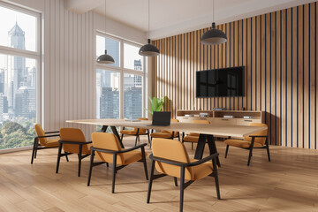 White and wooden board room corner with TV