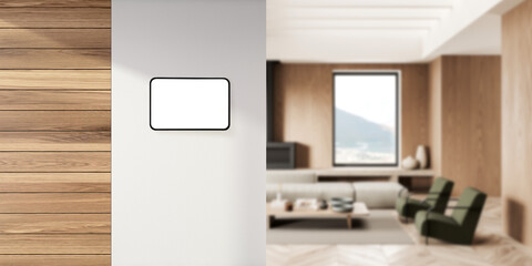 Smart home tablet in wooden living room