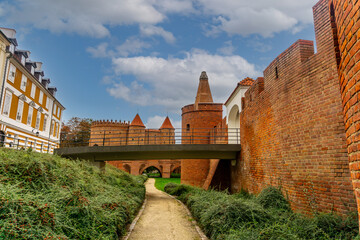 Old fortified Castle Barbican located in the center of Warsaw, Poland, October, 2023. - obrazy, fototapety, plakaty