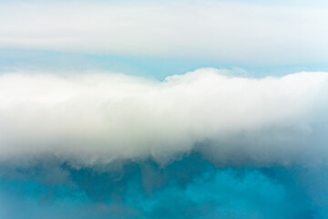 White cloud on blue pre-storm sky in New York, USA, background, weather