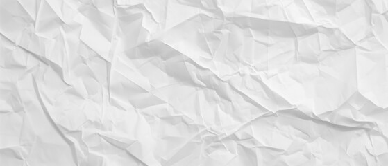 Fototapeta premium Crumpled, crinkled white office paper. Sharp textures and contrast. Graphic resource background and wallpaper.