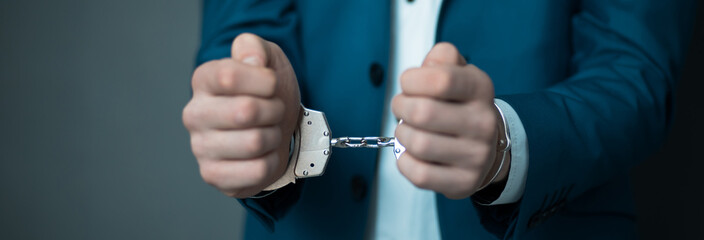 man hand handcuffs