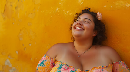 Portrait of joyful curvy young woman