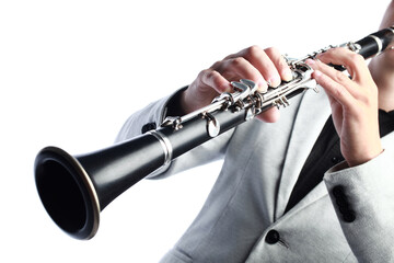 Clarinet player. Clarinetist hands playing woodwind instrument isolated