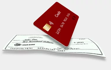 Fotobehang A check and a credit card are seen in a 3-d illustration about how debts are paid. © Rob Goebel