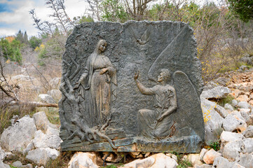 The Annunciation – First Joyful Mystery of the Rosary. A relief sculpture on Mount Podbrdo (the Hill of Apparitions) in Medjugorje.
