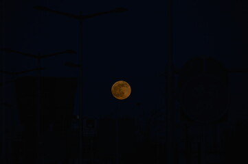 full moon over the dark