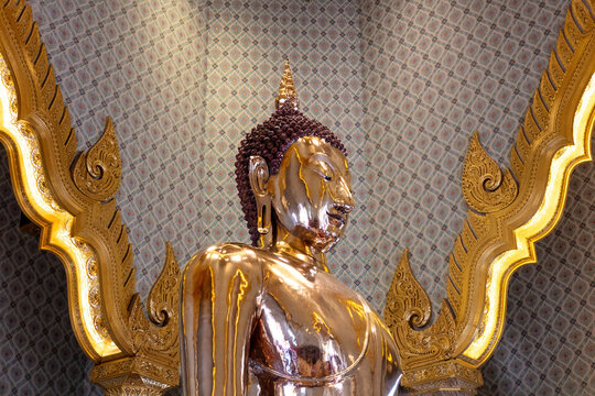 Closeup of golden Buddha statue, Wat Traimit (Temple of the Golden Buddha). Made of 18 karat gold, it is 3 meters (nearly 10 feet) tall, and weighs 5.5 tons. 
