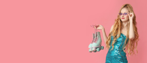 Stylish young woman with vintage roller skates on pink background with space for text
