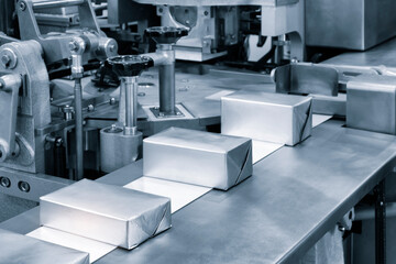 Production line for food packaging in metal foil