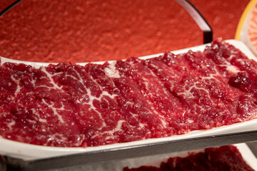 Beef slices on a white plate