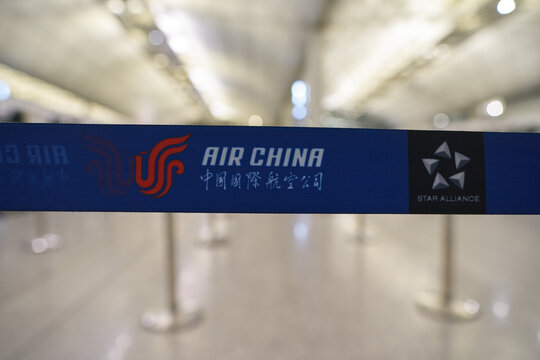 HONG KONG, CHINA - DECEMBER 04, 2023: close up shot of retractable belt barrier as seen at check-in area in Hong Kong International Airport.