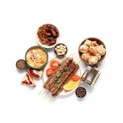 Traditional Eastern dishes and Muslim lantern on white background. Ramadan celebration