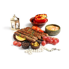 Traditional Eastern dishes, prayer beads and Muslim lantern on white background. Ramadan celebration