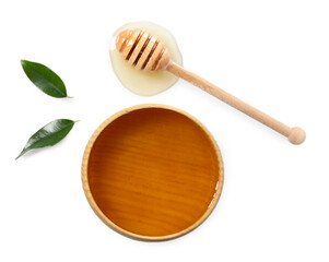 Tasty honey in bowl, dipper and green leaves on white background, flat lay