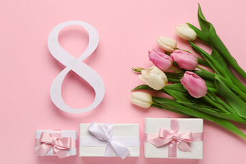Figure 8 made of paper with tulip flowers and gift boxes on pink background. International Women's Day celebration