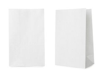 Open white paper bags isolated on white