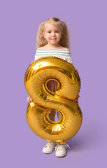 Cute little girl with golden air balloon in shape of figure 8 on lilac background. International Women's Day