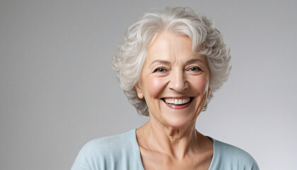 Joyful Elderly Lady with Gradual Hair Color Transition Grinning at the Camera