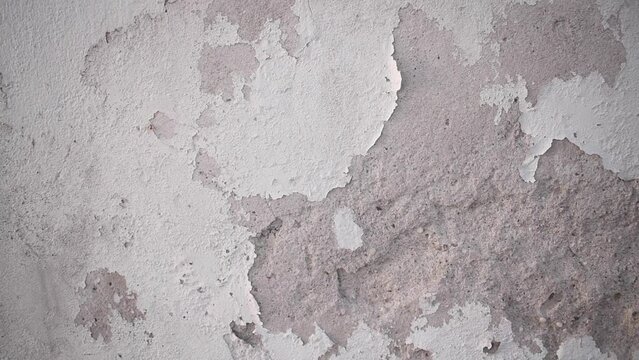 Textura de una pared desgastada de color blanco vieja 