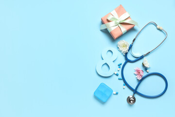 Composition with stethoscope, pills, flowers and gift for International Women's Day on color background