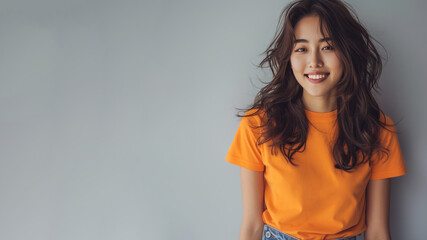Korean woman wear orange casual t-shirt smile isolated