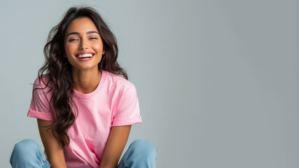 Indian woman wear pink casual t-shirt smile isolated - obrazy, fototapety, plakaty
