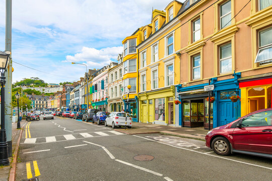 The main street of cafes, pubs and shops along the seaside promenade at Cobh, County Cork, Ireland. © Kirk Fisher