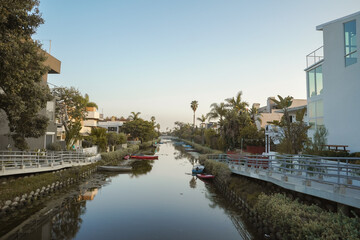 sunset in Venice canal, Los Angeles, California, modern houses and boats