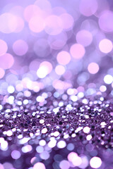 Abstract purple and pink glitter lights background. Circle blurred bokeh. Romantic backdrop for Valentines day, Women's or Mother's day, holiday or event