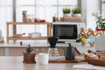 Equipment for making drip coffee is prepared and placed on the kitchen table at home, kitchen...