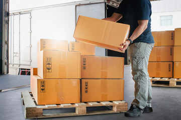 Warehouse Workers Lifting Package Boxes Stack on Pallet. Cartons, Cardboard Boxes. Supply Chain,...