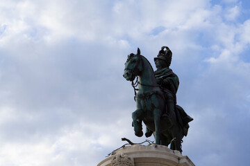 20.03.2022 Lisbon, Portugal. View of the Praça do Comércio. Lisbon monuments. Rua Augusta Arch and statue of King jose I. next to the Praça do Comércio (Commerce square) in Lisbon, Portugal.
