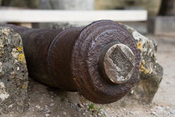 Old cannons in the Lisbon bastion. Castelo de S. Jorge cannons and view on the city. Ancient...